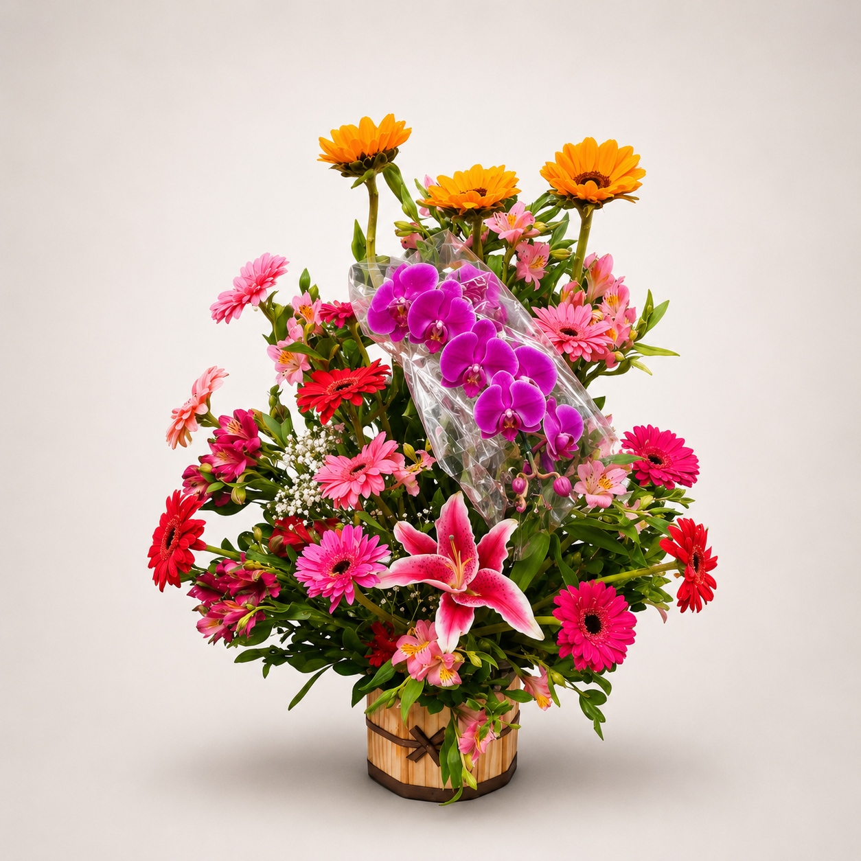 ARRANJO DE ORQUÍDEA COM
GIRASSOL LÍRIOS E GÉRBERAS