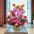 ORQUÍDEA COM GIRASSOL, GÉRBERAS E LÍRIOS